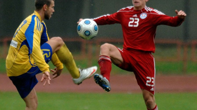 Aleksandrs Cauņa (pa labi) pret Edgaru Gauraču
Foto: Romans Kokšarovs, Sporta Avīze, f64