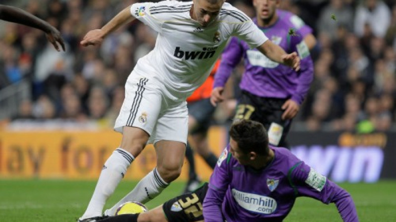 Karims Benzemā ("Real Madrid") cīņā ar Ivanu Gonsalesu ("Malaga")
Foto: AP/ Scanpix Sweden