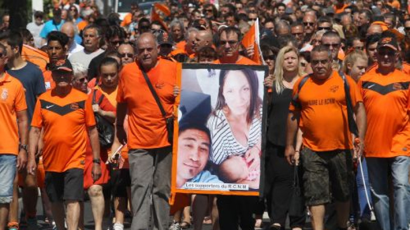 Līdzjutēji piemin Kolinsu ģimenes nelaimi
Foto: AFP/Scanpix