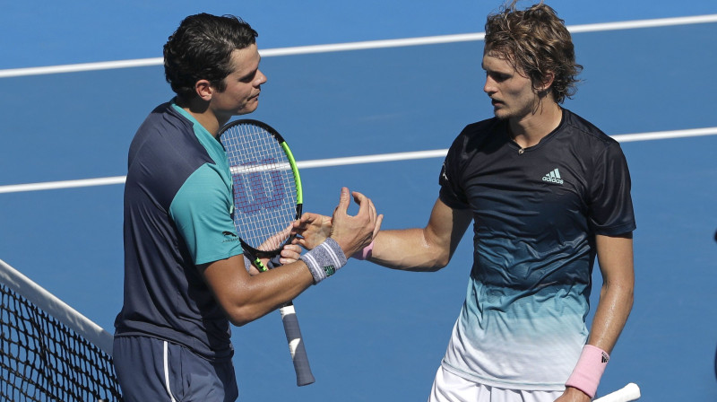 Milošs Raoničs otro reizi pieveica Aleksandru Zverevu "Grand Slam" 4. kārtas mačā. Foto: AP/Scanpix